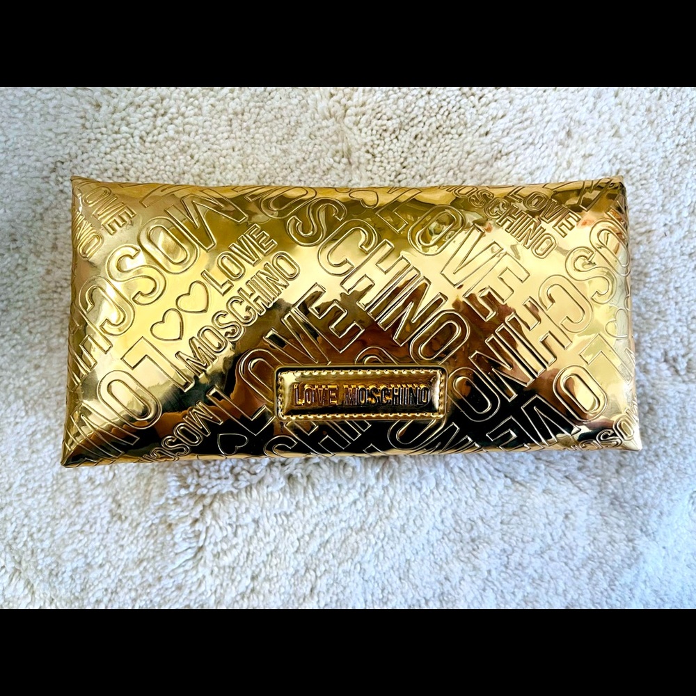 Embossed Love Moschino logo metallic patent clutch